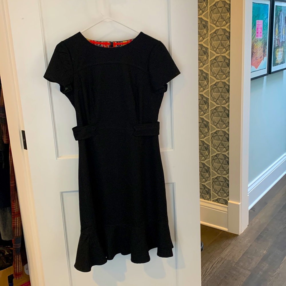 Black wool dress with flared hem